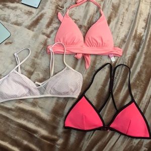 Three swim suit tops